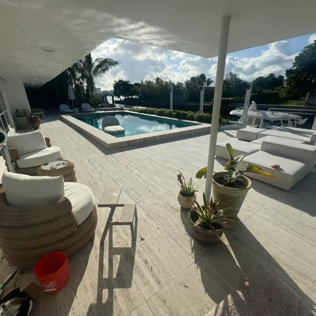 After-32x43 custom marble pool deck.