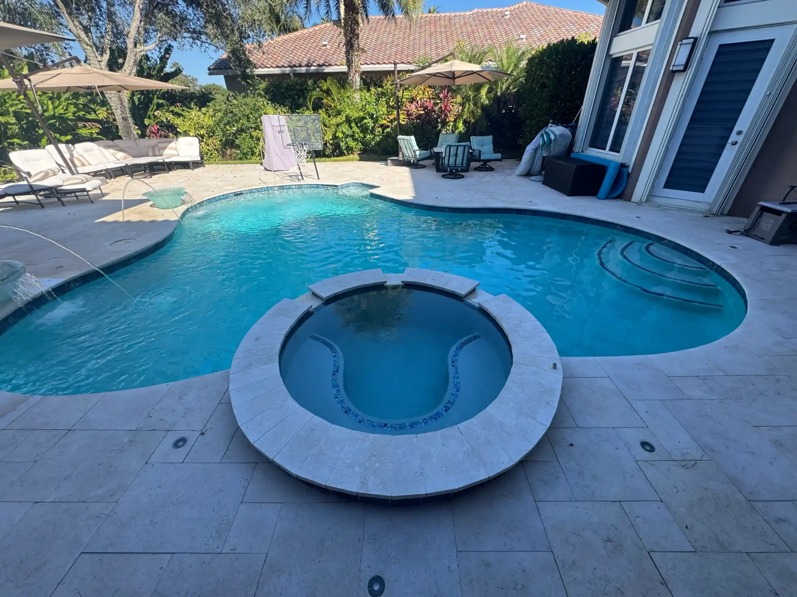 After - French pattern pool deck remodel
